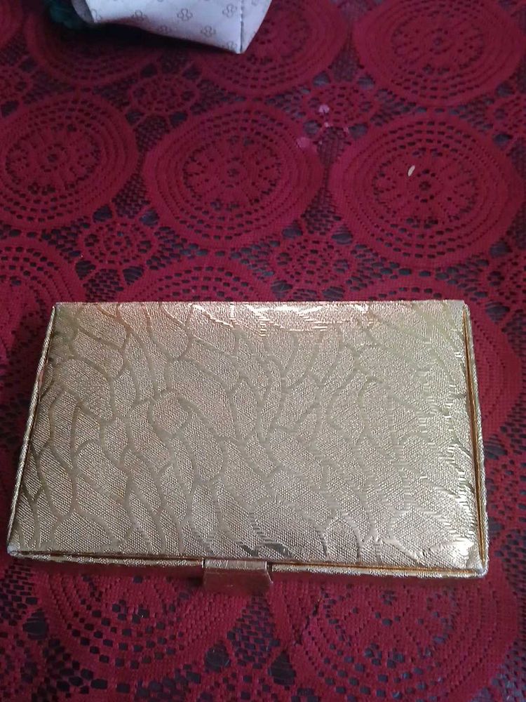Elegant Gold-Tone Clutch