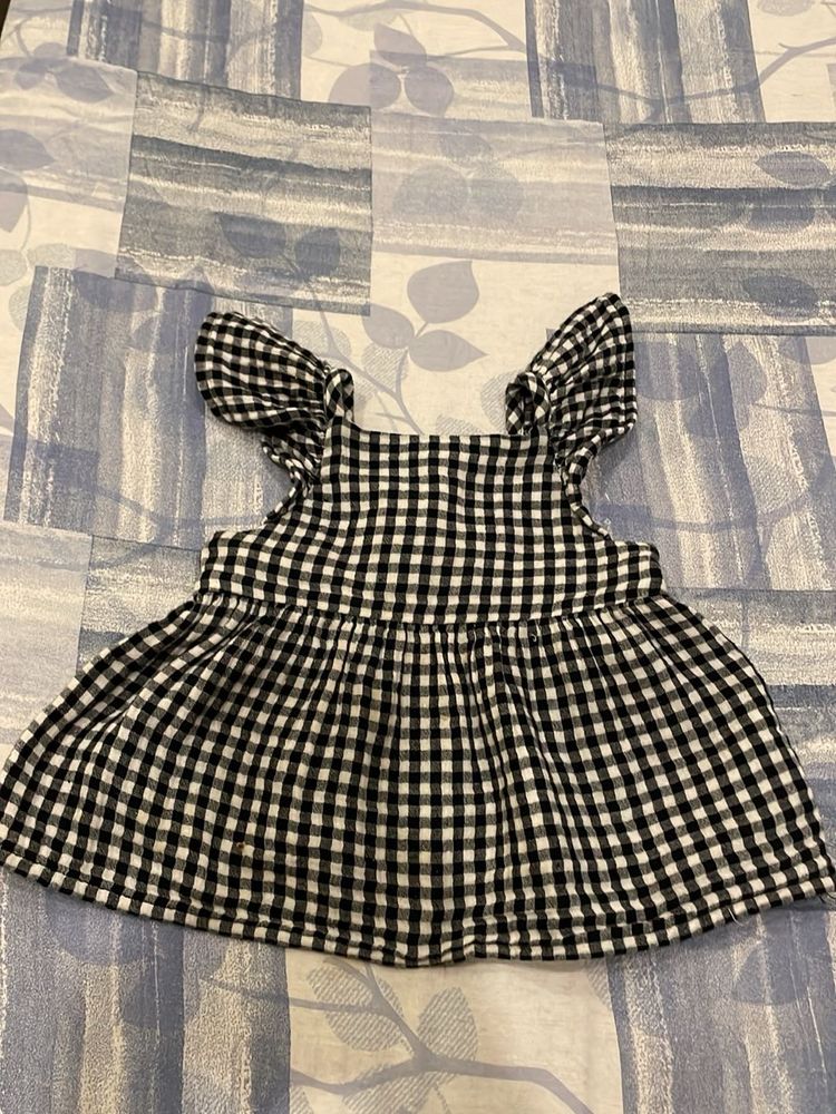 Checked top with flutter sleeves