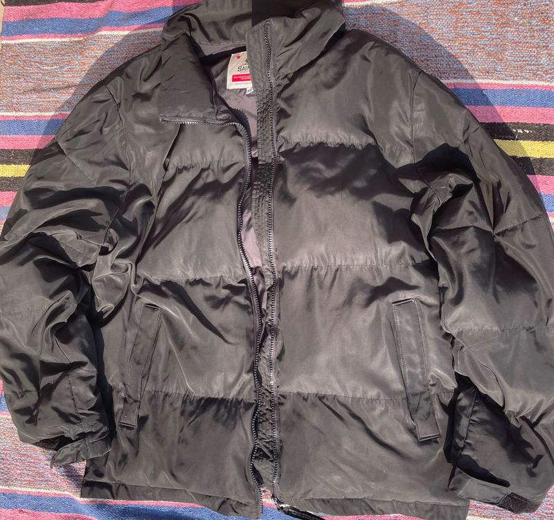 black oversized puffer jacket