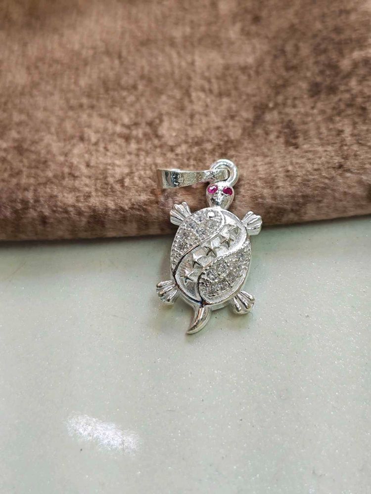 Turtle design locket with pink stone