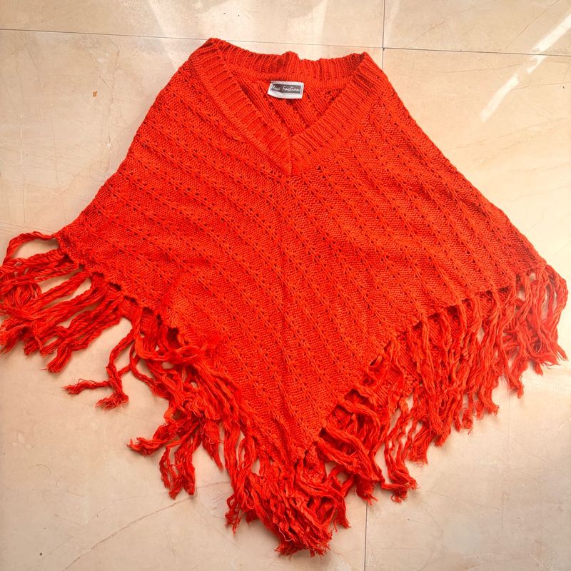 Cozy Orange Knit Poncho with Fringe