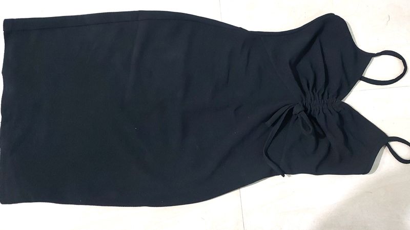 Black Ruched Bodycon Dress With tie up Details, has Shoulder Straps , Sleevesless