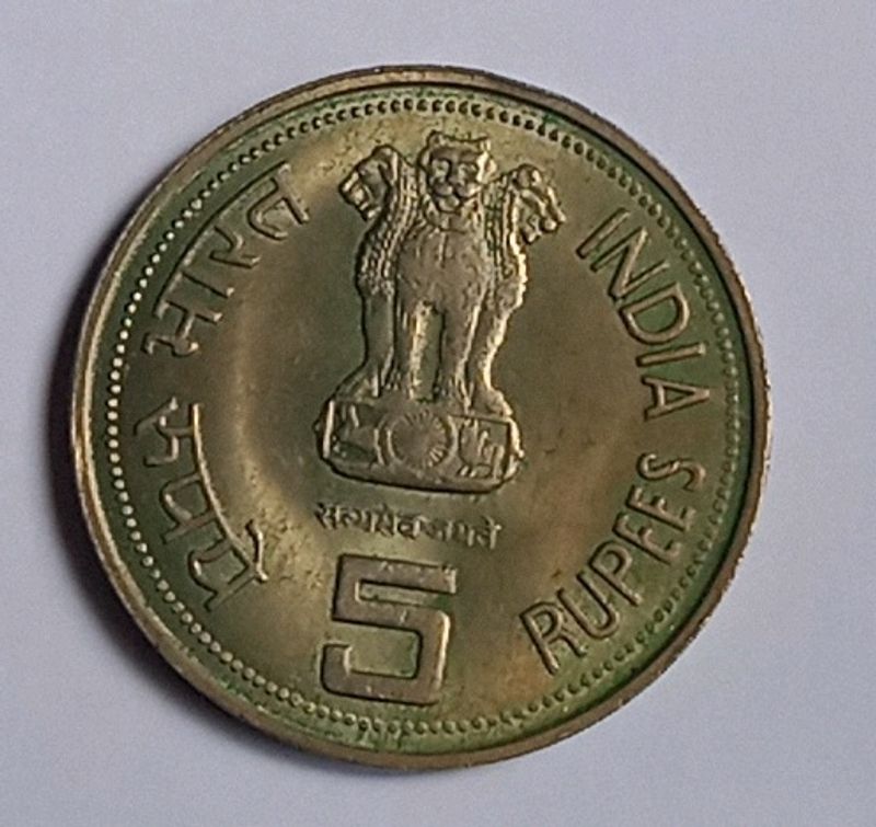 5 rs coin with indira gandhi face one side