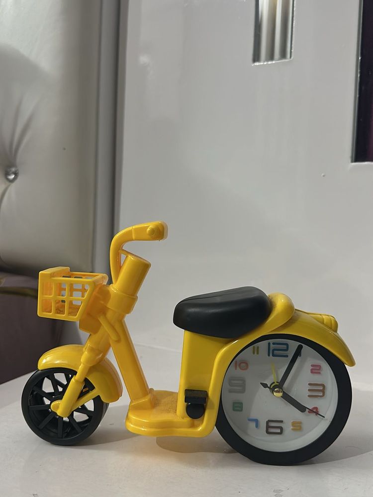 “Yellow Cycle Small Clock”