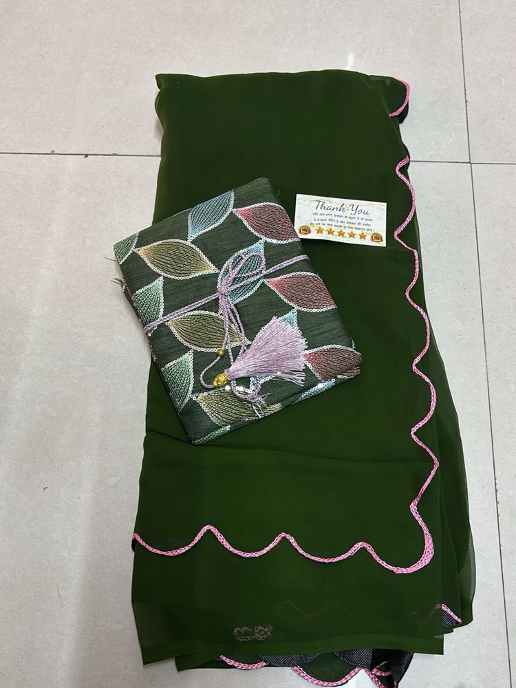 Elegant Green Saree with Pink Border