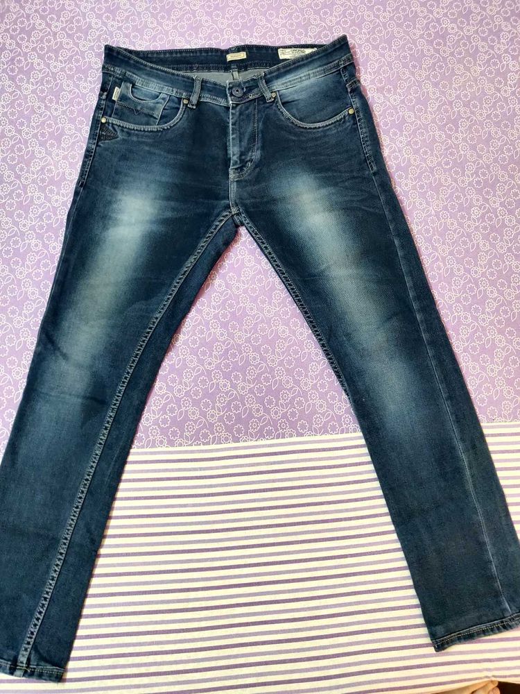 Classic Slim Fit Blue Denim Jeans.