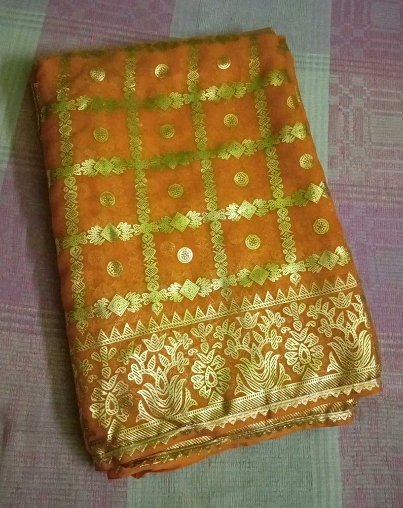 Elegant yellow Saree with Gold Details