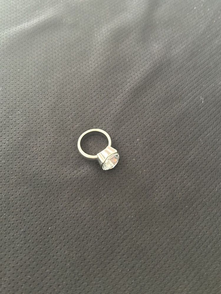 Artificial silver ring with a big diamond