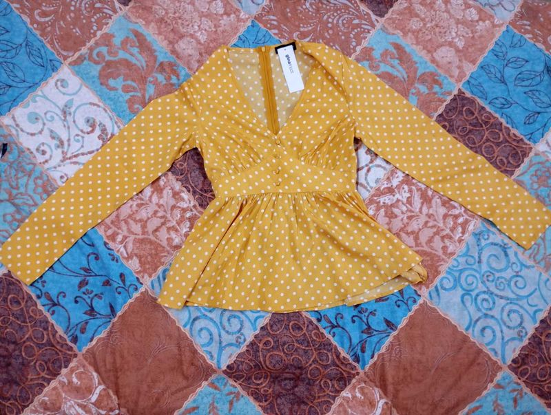 Polka Dot Peplum Top