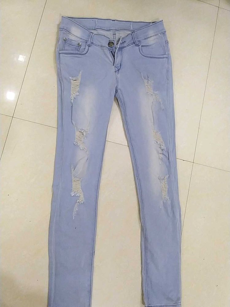 A Ripped Blue Jeans
