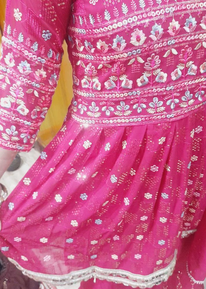 Pink Embroidered Anarkali frock.