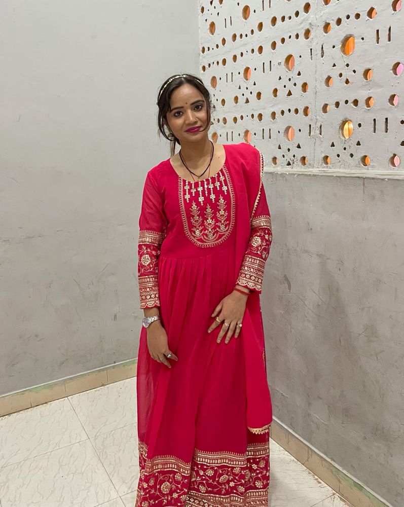 Elegant Pink Embroidered Gown
