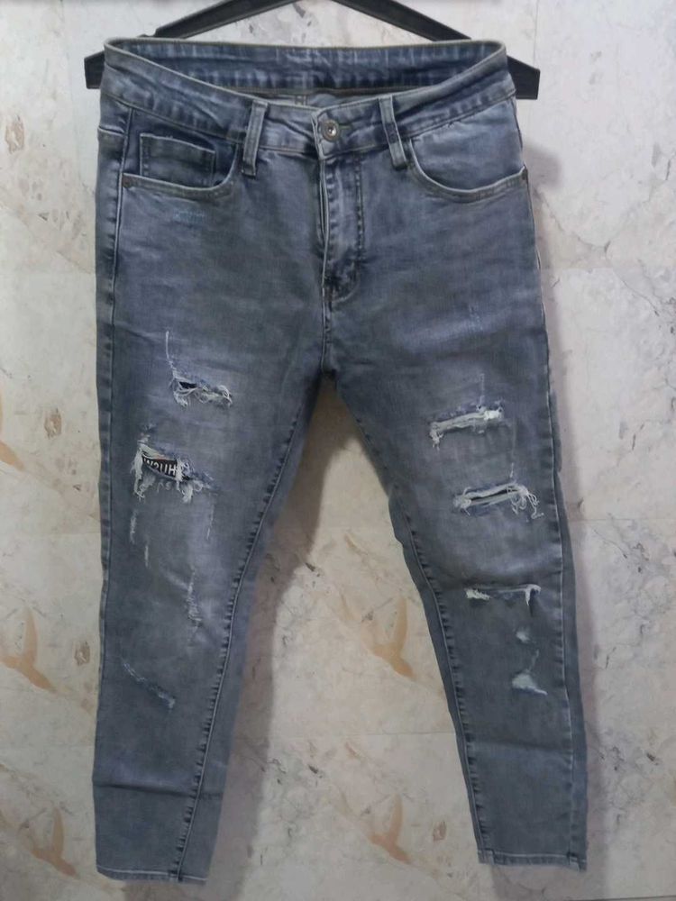 Ripped Gray Wash Jeans