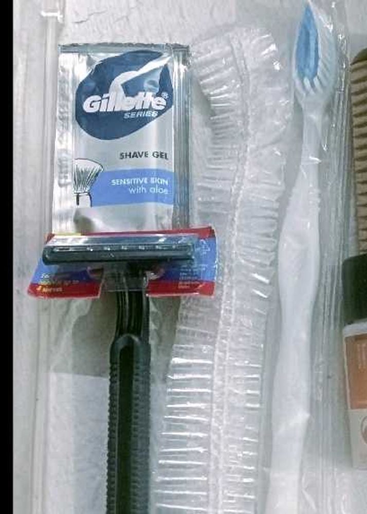 Shaving Blade, Cream ,Shower Cap, Tooth Brush