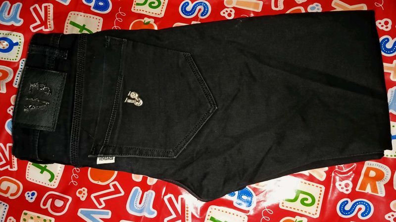 Versace Black Jeans. Size (28)