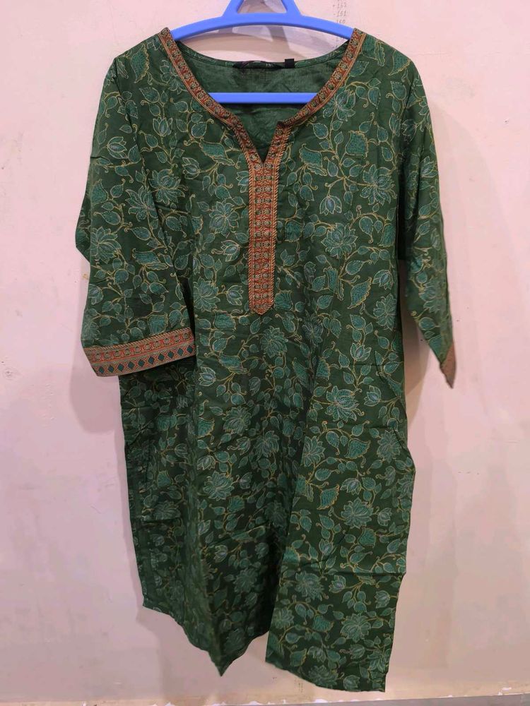 Green floral print kurti with golden detailing
