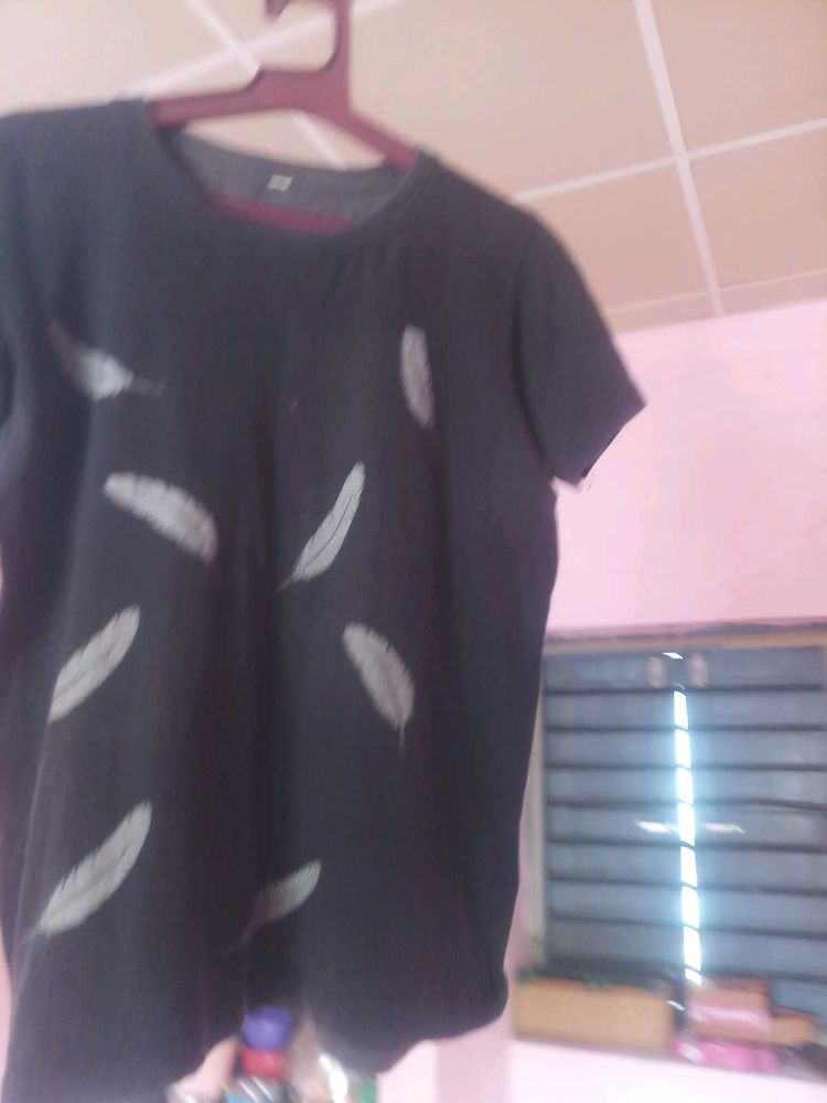 Myself Charan, I am selling my old black t Shirt