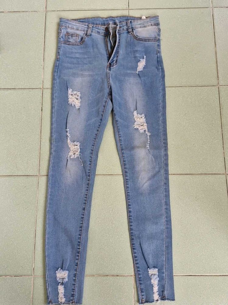 Ripped Light Wash Jeans