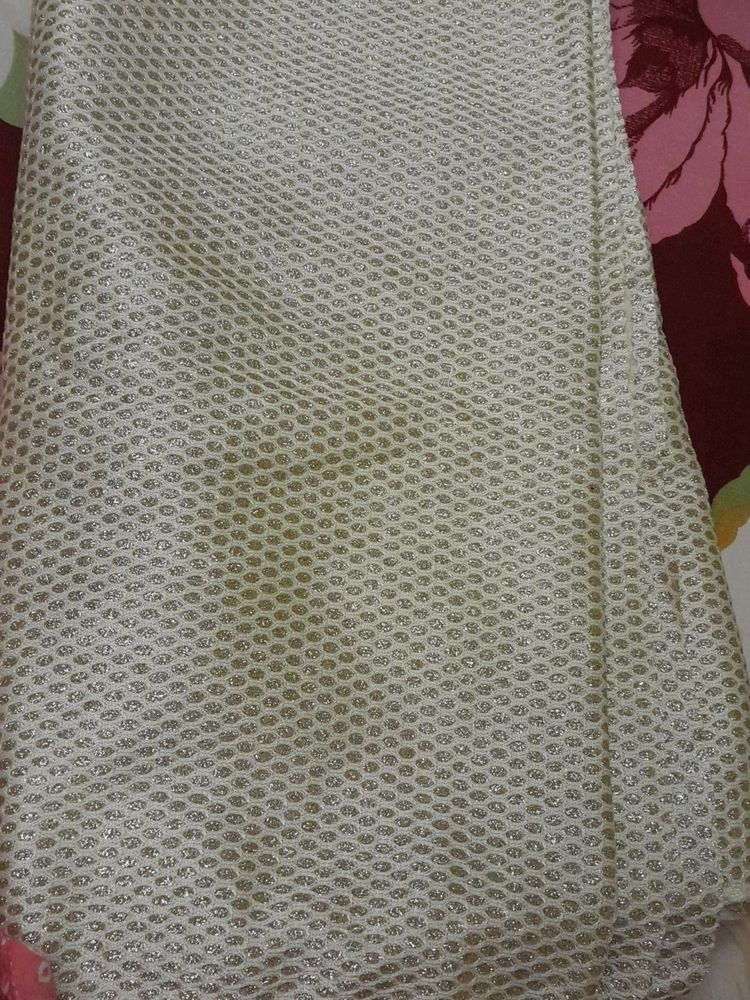 White And Golden Fabric
