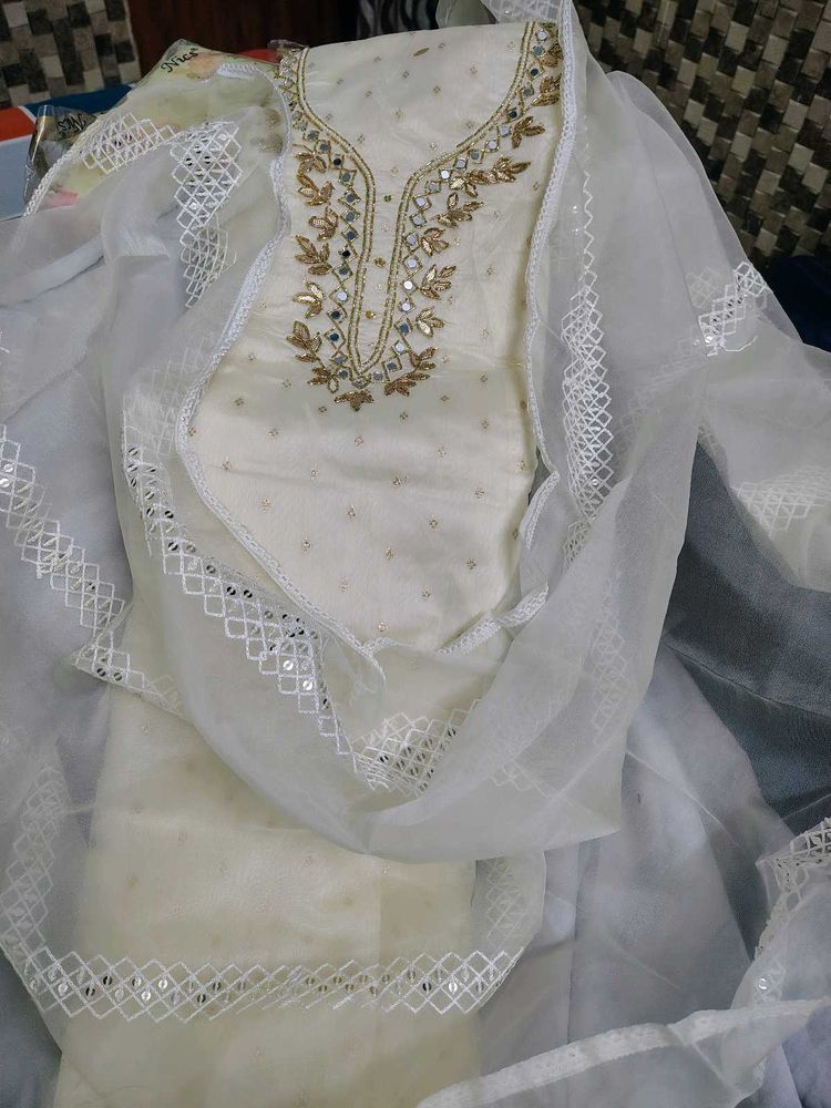 Elegant Cream Embroidered Salwar Kameez