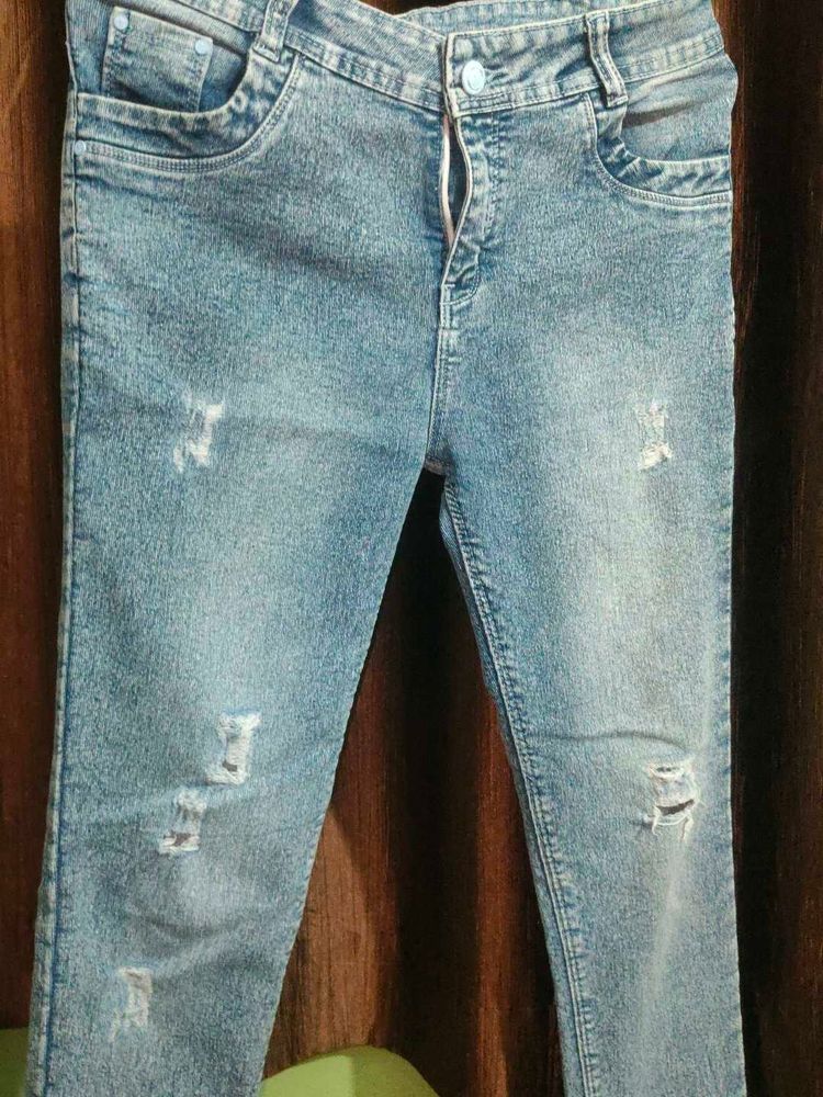 Ripped Blue Denim Jeans