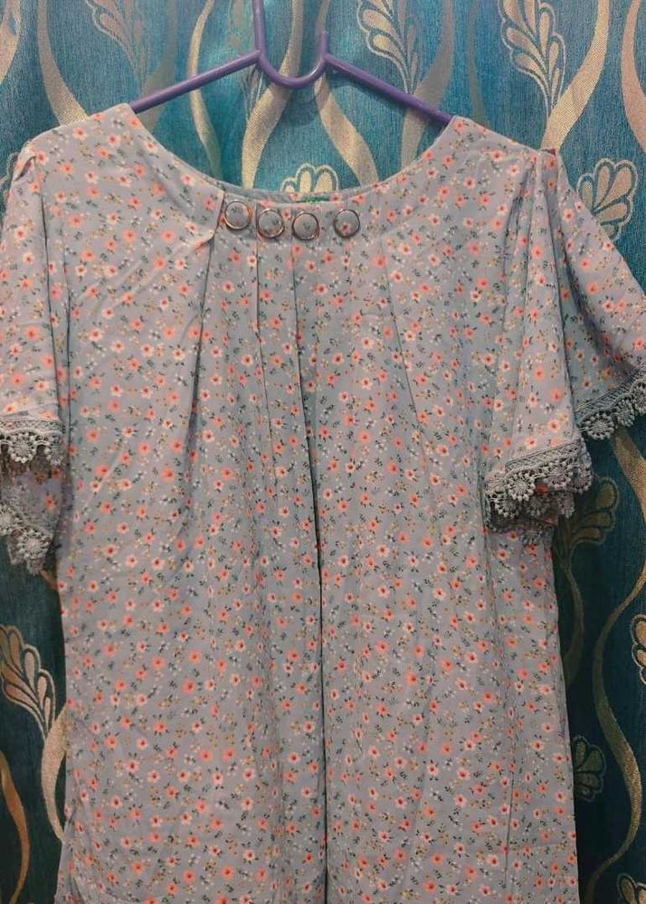 Blue Top With batwing sleeves