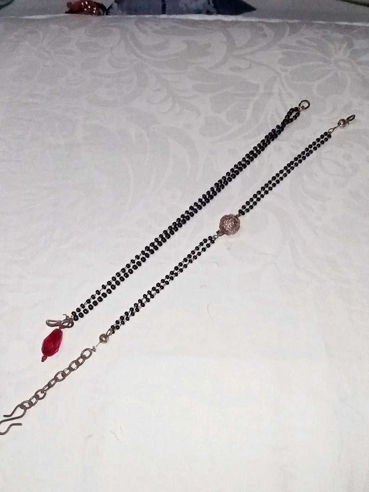 hand .Mangalsutra Chains