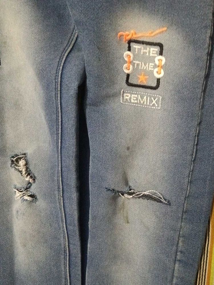 Distressed Denim Jeans