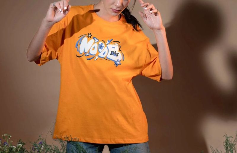 Unisex Down Shoulder Orange Graphic Tee