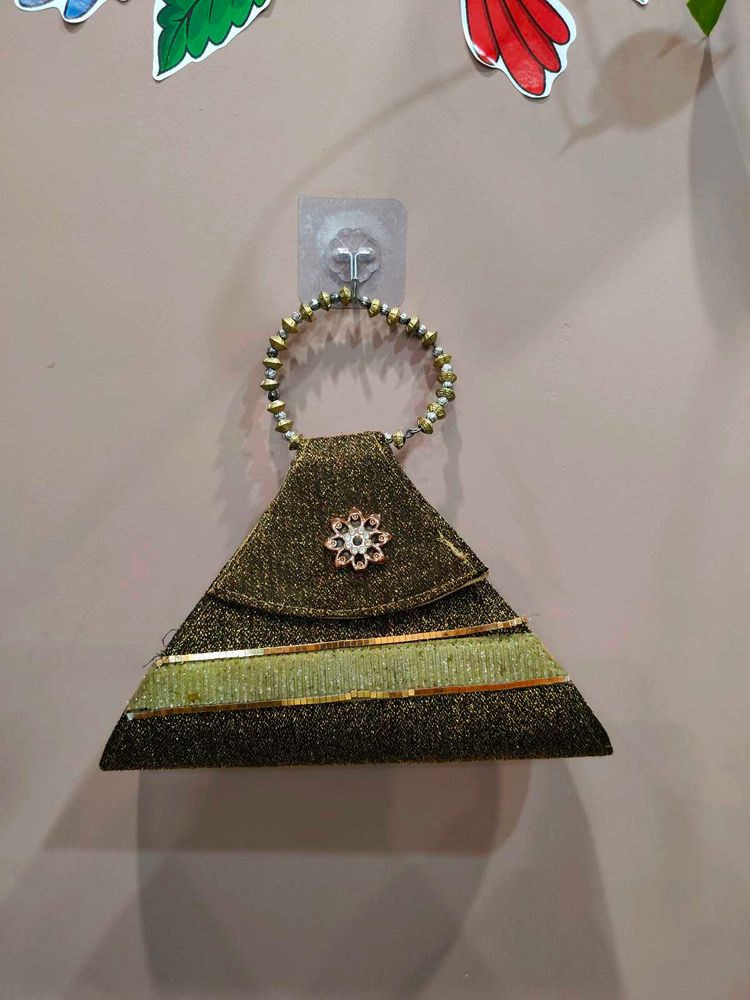 Unique Triangular Clutch