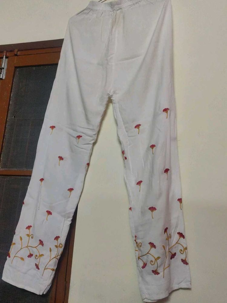 White Plazzo Having Floral Embroidery.