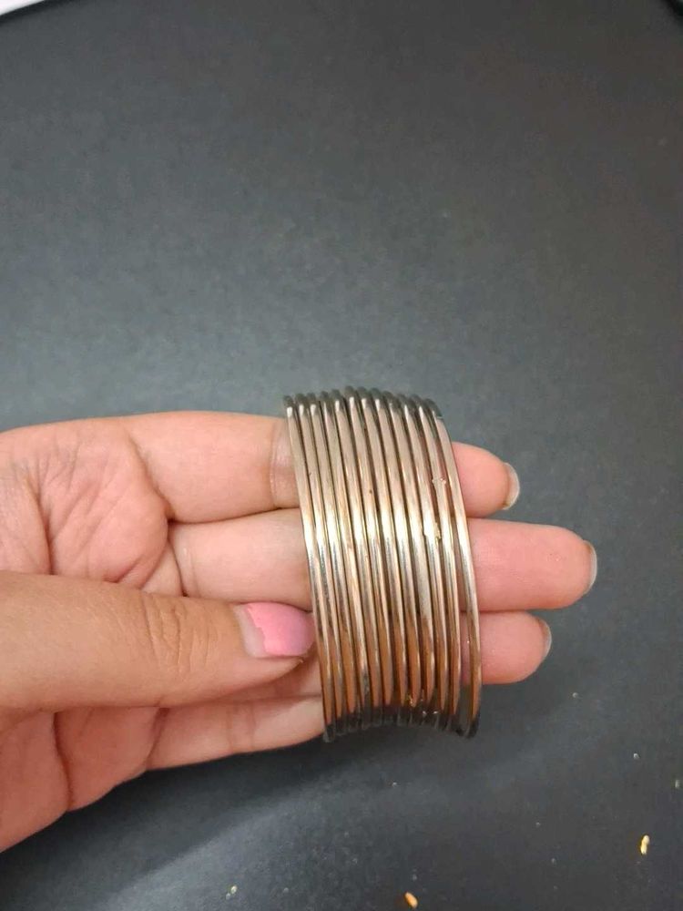 Pair Of 6 Silver Bangles