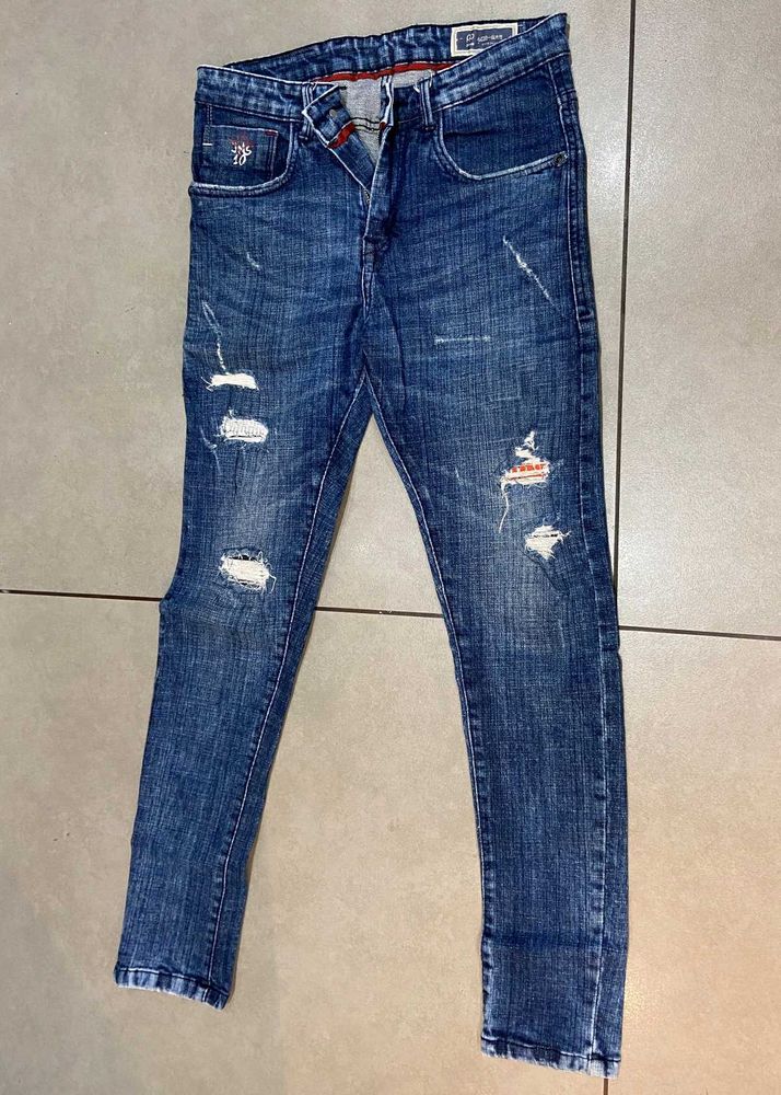 Distressed Denim Jeans