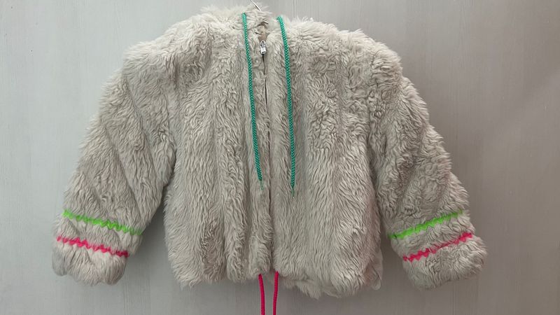 white fur jacket
