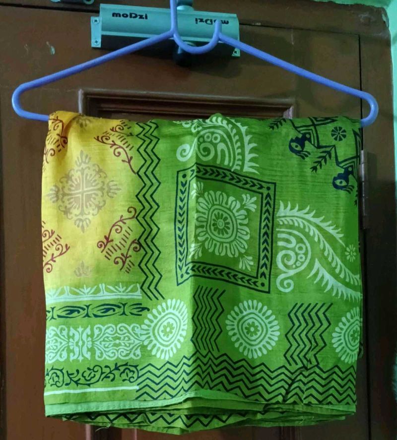 Mustard Yellow Tribal print Saree with Olive Green