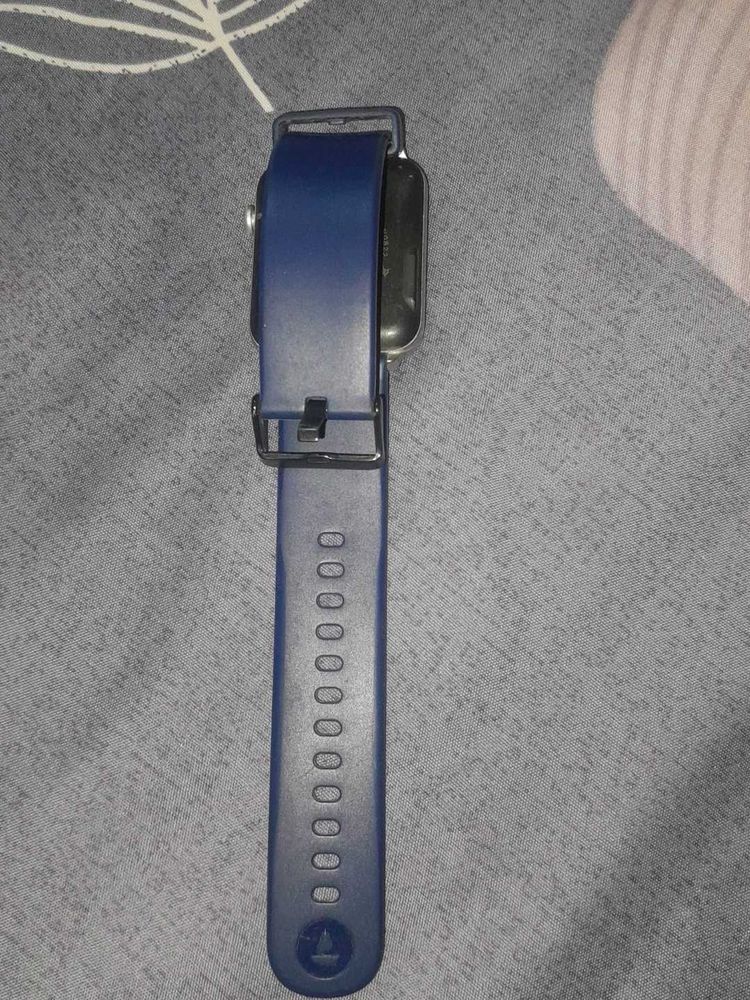Blue Smartwatch with charger