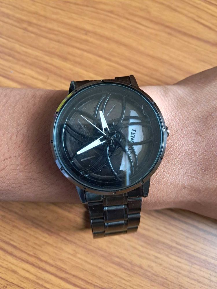 Black Metal Rotating Wheel Inside The Watch Trendw