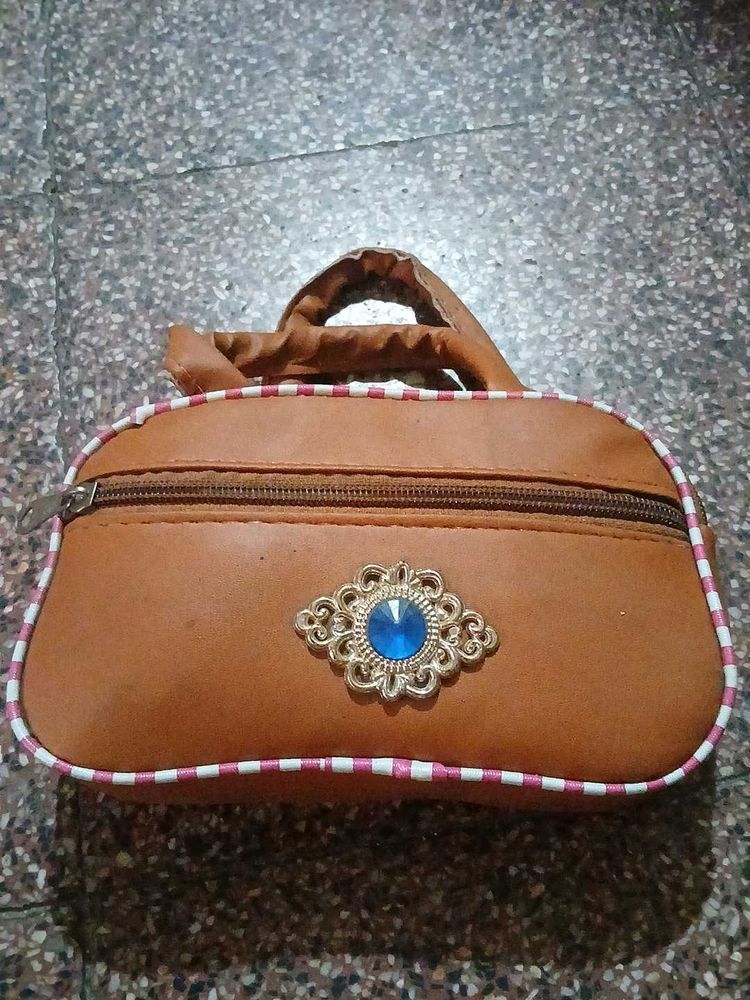 Brown Handbag with Blue Stone