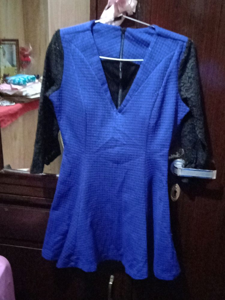 woolen top with net sleeves and back zip i used only once because it has deep neck from front and becoz of size issue