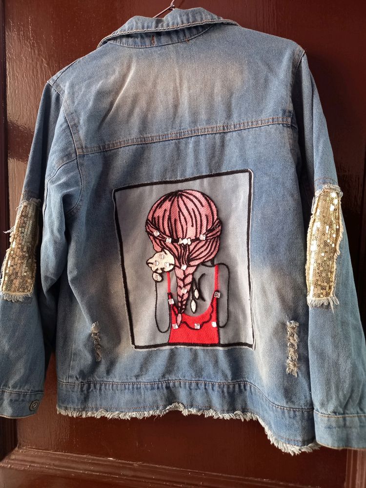 ripped denim jacket with sequins