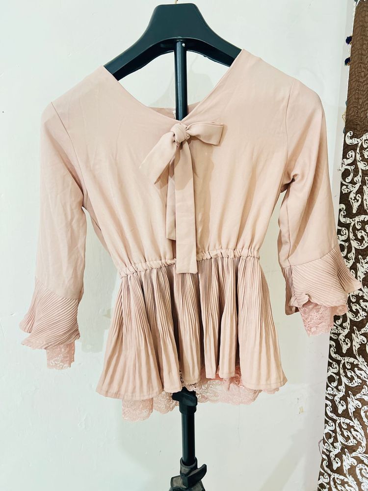 Cute Peach Peplum Top with Bow
