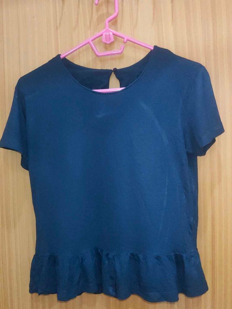 Globus Frill Top