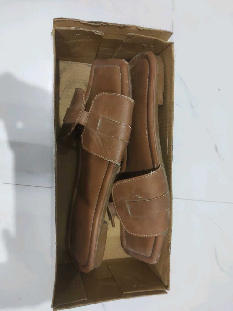 Brown Leather Slide Sandals And White Bellies