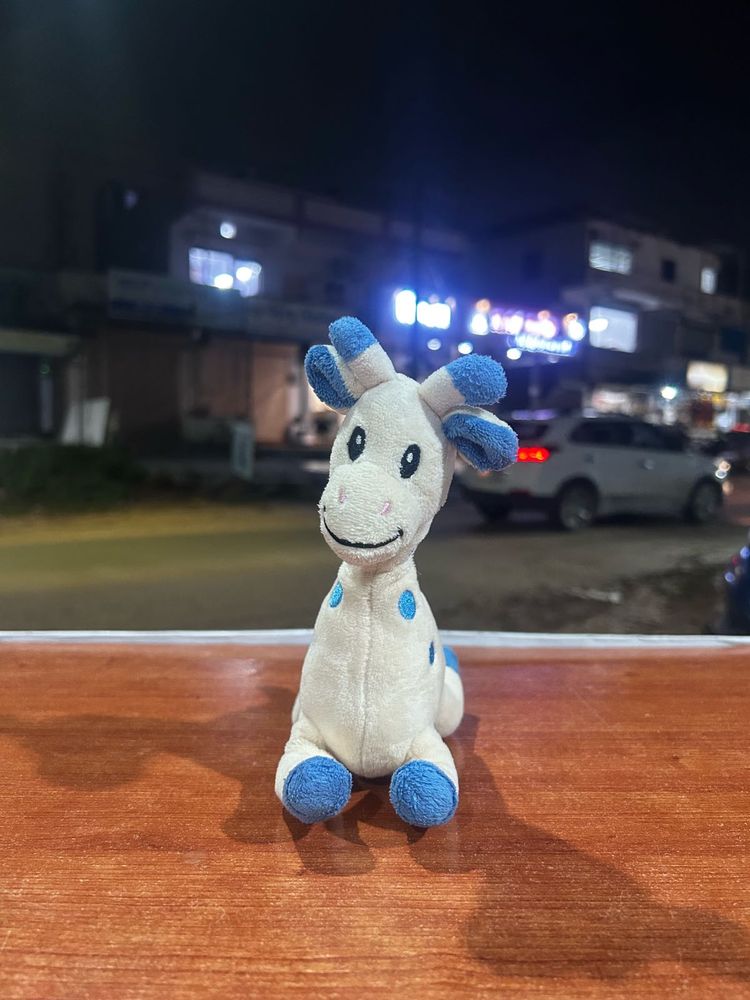 Novalac white and blue giraffe rattle sound toy