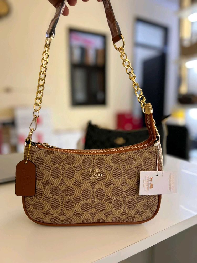 Coach Slings In Stock