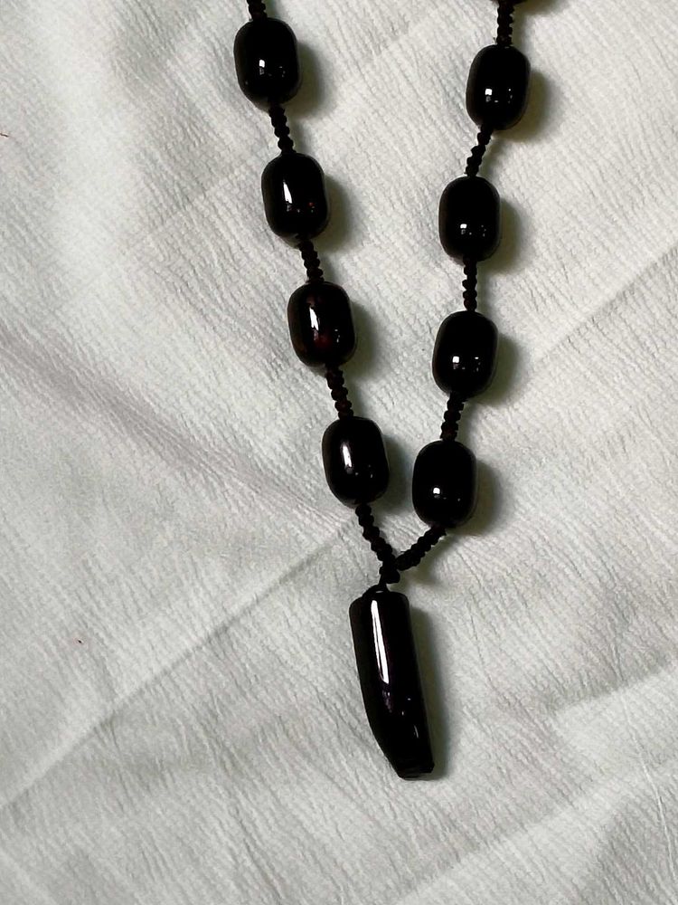 Black Bead Necklace with Lion Nail Pendant