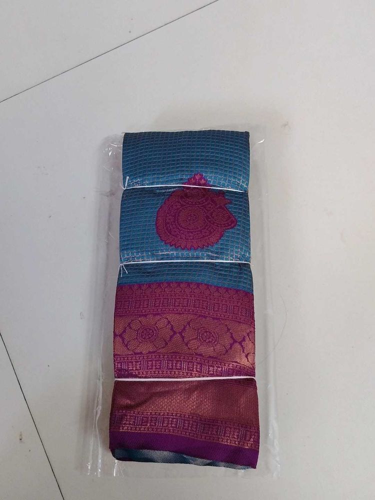 Elegant Blue &amp; Pink checked Saree