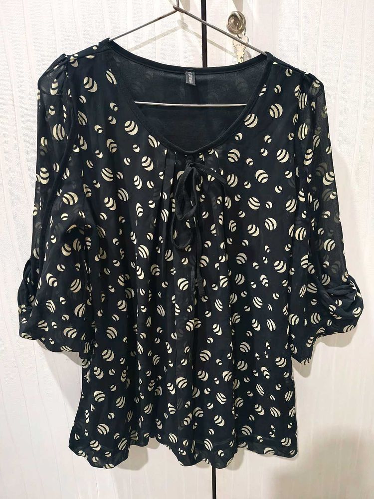 Elegant Sheer Print Top