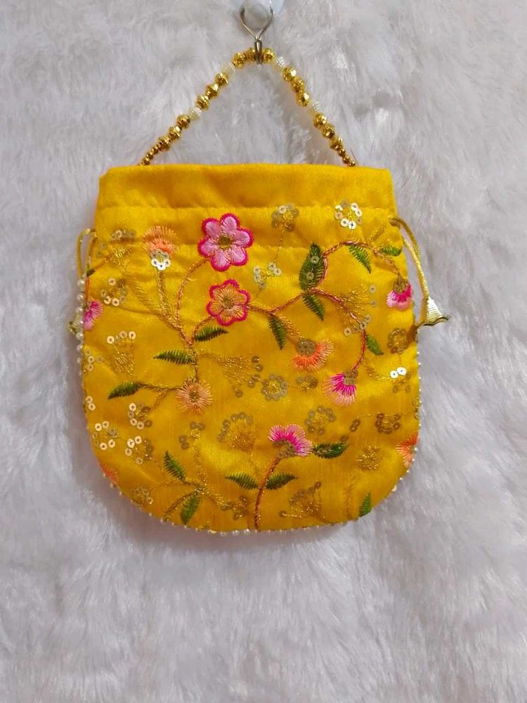 Yellow And Pink Potli Embroidery Design