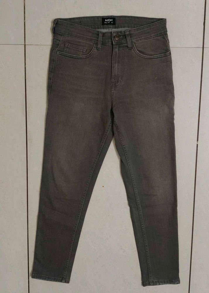 Grey Denim Jeans.     (Size- Waist 28. Length 30)